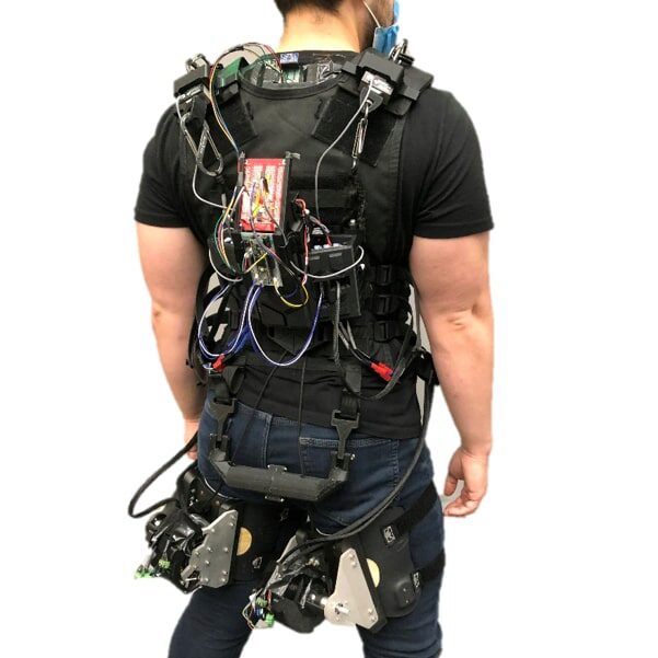 Student wearing hip exosuit