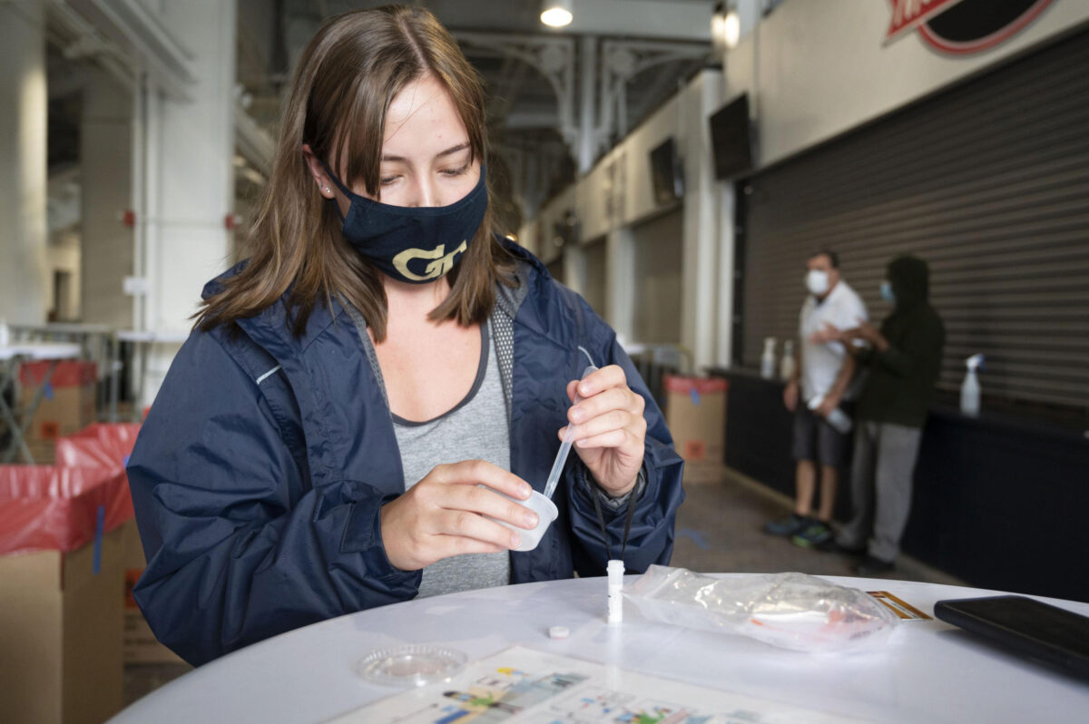 A student participates in Covid-19 surveillance testing.